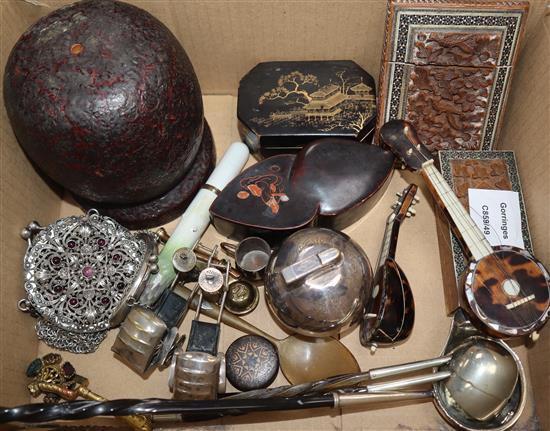 A group of objects of vertu including tortoiseshell and mother of pearl models of a banjo and a mandolin, two Indian sandalwood cases a